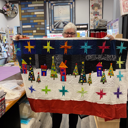 Joan Barron with another beautiful applieque quilt